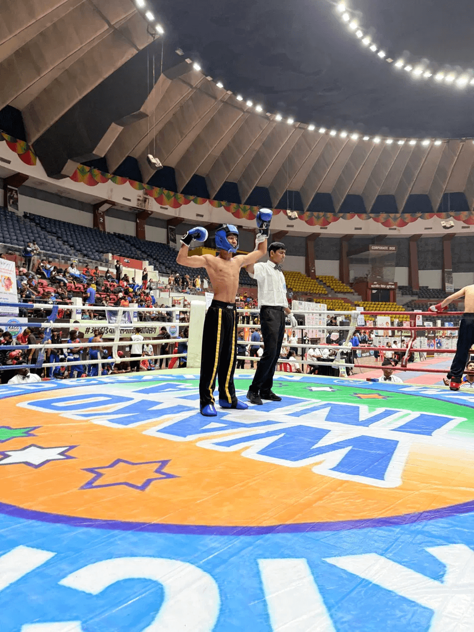 Winner pose in arena